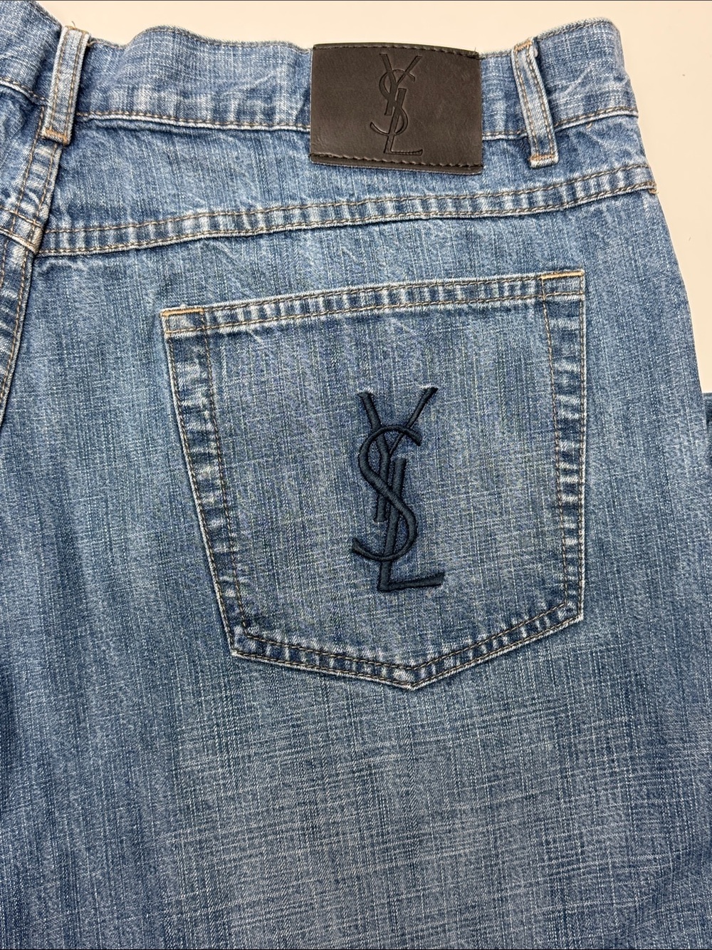 Yves Saint Laurent Men’s Light Blue Denim Jeans with Navy Embroidered YSL
